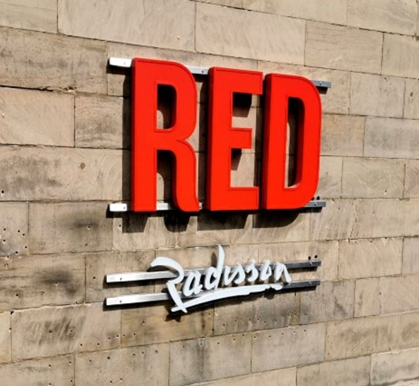 Outside branding signage by Applelec for Red Radisson Hotel Liverpool
