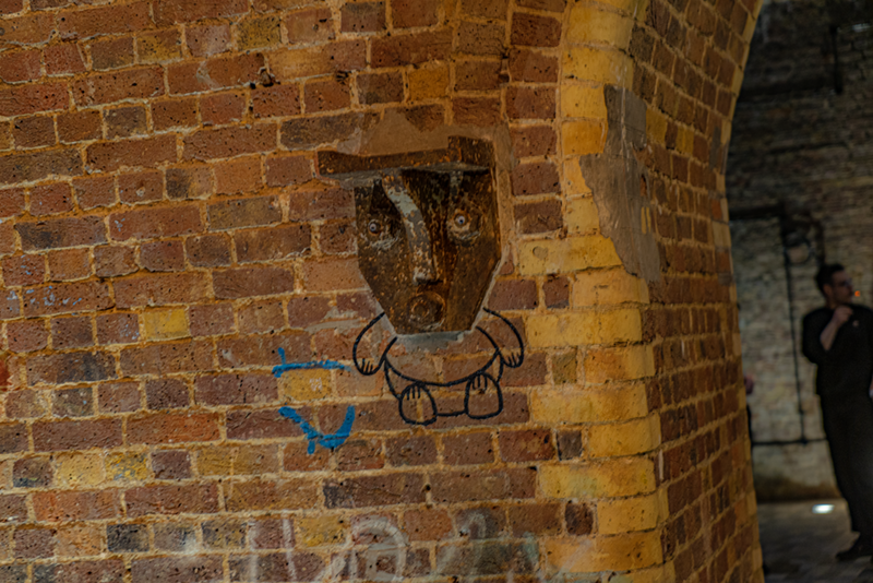 2nd example of industrial ironmongery attached to wall turned into a gorgoyle feature