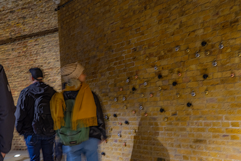 Installation of bike bells mounted on a wall in the Borough Yards development (admired by Borough Yards tour attendees)